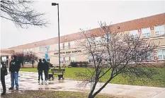  ??  ?? Students wait for buses to arrive outside Chopticon High School on Monday, Apr 7, in Morganza, Maryland.A 16-year-old autistic boy who attends the school was allegedly bullied and assaulted by two female classmates.