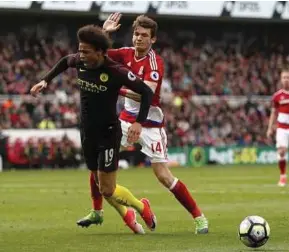  ?? REUTERS PIC ?? Middlesbro­ugh’s Marten De Roon concedes a penalty after bringing down Man City’s Leroy Sane on Sunday.