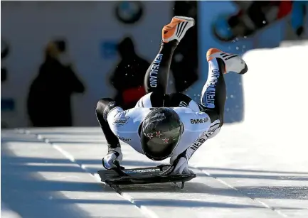  ?? SEAN HAFFEY/GETTY IMAGES ?? Skeleton racer Rhys Thornbury is also a member of the British Royal Air Force in weapons and explosives.