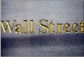  ?? MARK LENNIHAN — THE ASSOCIATED PRESS FILE ?? Gains among technology companies helped snap a three-day losing streak for U.S. stocks Friday, though the market ended with its worst weekly loss since March.