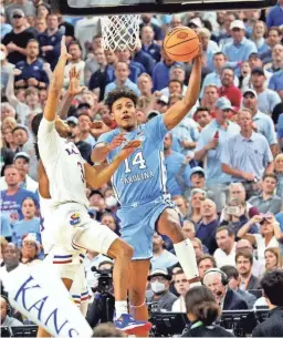  ?? USA TODAY SPORTS ?? North Carolina’s Puff Johnson (14), brother of Suns forward Cam Johnson, had 11 points and 6 rebounds in the NCAA title game against Kansas.