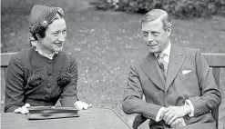  ?? GETTY IMAGES ?? Edward VIII, Duke of Windsor, sits with his wife Wallis Simpson at the Chateau de Cands in France, 1937.