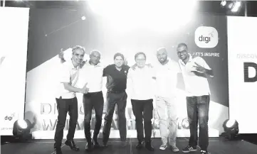  ??  ?? (From left) Digi’s chief executive officer Albern Murty, chief technology officer Kesavan Sivabalan, chief financial officer Nakul Sehgal, chief marketing officer Loh Keh Jiat, chief corporate affairs officer Joachim Rajaram, and Praveen pose for a photo during the opening of Digi Digital Day.