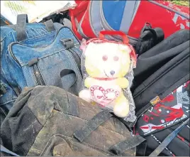  ?? HT PHOTO ?? A soft toy lies amid the victims’ schoolbags near the accident spot in Nurpur on Tuesday.