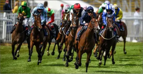  ??  ?? Aidan O’Brien’s More Beautiful (centre), with Seamie Heffernan on board, after winning at Naas on racing re-start day, Monday, June 8.