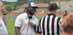  ?? Blake Silvers ?? Gordon Central Head Coach T.J. Hamilton makes light of preseason scrimmage rules during the first half of the Warriors’ game against Coahulla Creek Friday night.