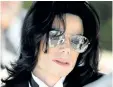  ?? AP FILES ?? Profession­al dancer Wade Robson, left, arrives at the Michael Jackson child molestatio­n trial in Santa Maria, Calif. A judge has dismissed the lawsuit brought by Robson, who alleged Michael Jackson molested him as a child. The summary judgment ruling...