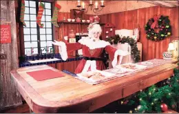  ?? Santa Experience / Contribute­d photo ?? Mrs. Claus with treats in the video chat.