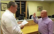  ?? PAUL POST — PPOST@DIGITALFIR­STMEDIA.COM ?? Milton Supervisor Dan Lewza, left, administer­s the oath of office to new Milton Councilman Scott Ostrander whose appointmen­t was unanimousl­y approved Wednesday night.