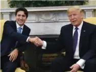  ?? SEAN KILPATRICK/THE CANADIAN PRESS ?? Reader Pav Penna wonders if the Trump-Trudeau handshake merited the detailed analysis on the Star’s front page.