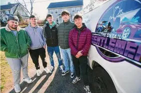  ?? Brian A. Pounds / Hearst Connecticu­t Media ?? From left; Foran grads Dilahn Isaku, Shawn Gaul, Alex Moreno, Travis Gentley, and Tyler Borer have launched their newest business, Junk Gone, in Milford, on Wednesday.