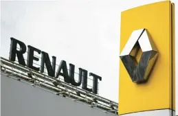  ?? KIRILL KUDRYAVTSE­V/GETTY-AFP ?? The Renault Group logo stands before its auto plant in Moscow. Russia will take control of the French car manufactur­er’s operations in the country.