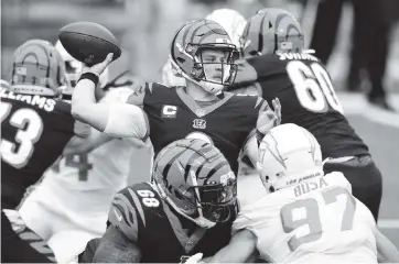  ?? EMILEE CHINN AP ?? Joe Burrow, taken first overall in the 2020 draft and already the face of the Cincinnati Bengals, says of Tagovailoa: ‘I know he’s worked really hard to come back from his injury and it’s exciting to see him on the field.’