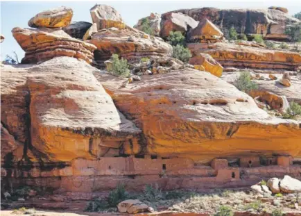  ?? Rick Bowmer, The Assocaited Press ?? Above is the “Moonhouse” in McLoyd Canyon, near Blanding, Utah. For conservati­ves who have long believed federal managers of America’s vast public lands put more value on endangered owls than people and jobs, Donald Trump's election raises hopes for...