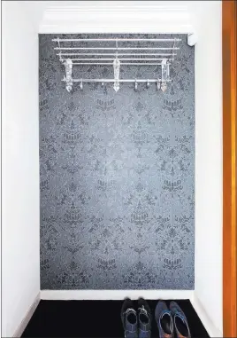  ?? Dreamstime ?? Wallpaper or mirror the back wall of your closet for some extra pizzazz.