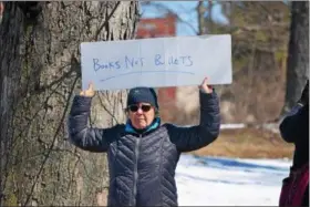  ?? MARIAN DENNIS – DIGITAL FIRST MEDIA ?? Many rally-goers in Riverfront Park Saturday brought signs to display while speakers addressed the crowd.