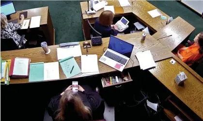  ?? ?? In this still image from security camera video, Traci Soderstrom looks at her cellphone during the trial in June. Photograph: AP