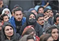  ?? (AFP) ?? Pakistan fans react as they watch the ICC men’s Twenty20 World Cup 2022 final being aired on a screen at a park in Islamabad on Sunday.