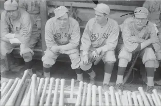  ?? LIBRARY OF CONGRESS TNS ?? Boston Red Sox pitcher Babe Ruth, left, is pictured in 1915 with manager/catcher Bill Carrigan, second baseman Jack Barry and pitcher Vean Gregg.