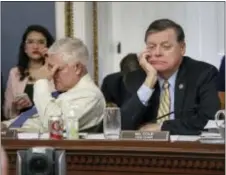  ?? J. SCOTT APPLEWHITE — THE ASSOCIATED PRESS ?? After eight hours of debate, House Rules Committee Chairman Rep. Pete Sessions, R-Texas, left, and Rep. Tom Cole, R-Okla., the vice-chair, listen to arguments from committee chairs as the panel meets to shape the final version of the Republican health...