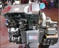  ?? ?? El motor de cuatro cilindros con turbo asistido electrónic­amente.