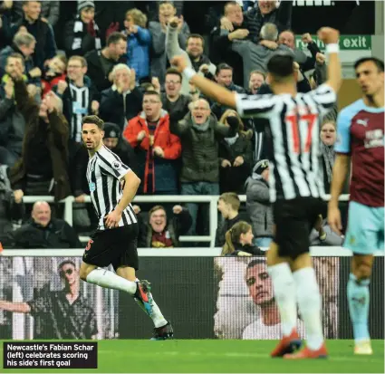  ??  ?? Newcastle’s Fabian Schar (left) celebrates scoring his side’s first goal
