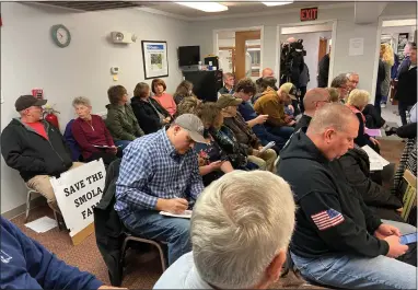  ?? EVAN BRANDT — MEDIANEWS GROUP ?? The audience at Tuesday night’s Upper Pottsgrove Commission­ers meeting including two television cameras and spilled out into the hallway due to lack of space.