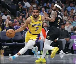  ?? JUSTIN FORD — GETTY IMAGES ?? Gabe Vincent (7) finished with nine points and four rebounds in the Lakers' victory over the Pelicans on Tuesday, as well as playing some tough defense.