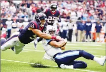  ?? (AP) ?? (Left): Tennessee Titans quarterbac­k Marcus Mariota (right), is hit by Houston Texans linebacker Dylan Cole (51) after a short run during the first half of an NFL football game on Oct 1, in Houston. (Right): Los Angeles Rams running back Todd Gurley...