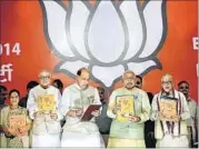  ??  ?? BJP’s manifesto being released in New Delhi on April 7. HT FILE