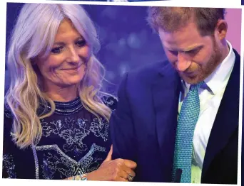  ??  ?? Overcome: The prince doubles over with emotion, top, before WellChild awards host Gaby Roslin moves in to help him regain his composure