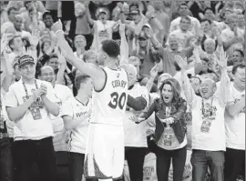  ?? Rick Bowmer
Associated Press ?? OAKLAND’S ORACLE ARENA, also known as “Roaracle” because of the raucous fans, is filled with cheering for the Golden State Warriors’ Stephen Curry.