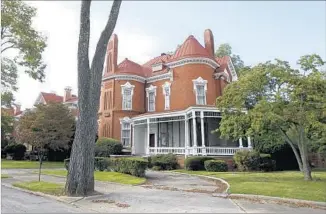  ??  ?? THE 37 buildings on Tyler Perry Studio grounds built between 1889 and 1910 include Quarters 10, above, where post commanders once lived in the historic district of what was once Ft. McPherson.