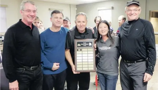  ?? —photo Vicky ?? Thanks to the 20th edition of the Michel Malboeuf curling tournament, an amount of $1,455 was presented to Embrun’s Maison de la camille snowsuit campaign and to the Club Optimiste Embrun for their 2018 Food Drive, which will be held on December 3....