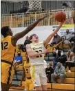  ?? BARRY BOOHER — FOR THE NEWS-HERALD ?? Riverside’s Andrew Taggart shoots past Brush’s Antwone Woolfolk on Jan. 22.