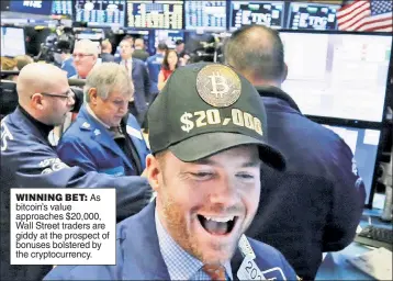  ??  ?? WINNING BET: As bitcoin’s value approaches $20,000, Wall Street traders are giddy at the prospect of bonuses bolstered by the cryptocurr­ency. :