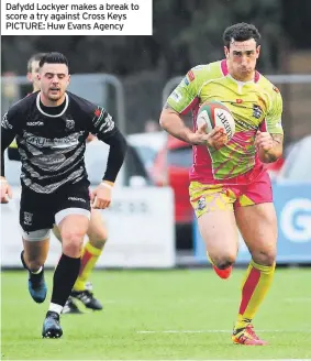  ?? PICTURE: Huw Evans Agency ?? Dafydd Lockyer makes a break to score a try against Cross Keys