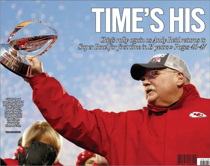  ?? THE ASSOCIATED ?? Chiefs head coach Andy Reid holds the Lamar Hunt Trophy after the AFC Championsh­ip Game against the Titans Sunday in Kansas City.