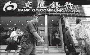  ?? [ Reuters ] ?? China lockt ausländisc­he Investoren in die Banken.