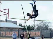  ?? Contribute­d photo by Shelly Culver ?? Rockmart’s Paine Culver cross the bar in the pole vault event on March 8 at the Rome Invitation­al Track and Field event. He placed second overall in the event.