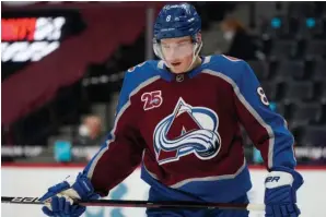  ?? The Associated Press ?? ■ Colorado Avalanche defenseman Cale Makar waits for a face off against the San Jose Sharks in the first period of Saturday’s game in Denver.