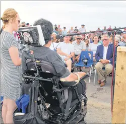  ?? CAPE BRETON POST ?? Callum MacQuarrie, with his back to the camera, addresses the crowd on Tuesday as the community celebrated beach and boardwalk improvemen­ts that have made Inverness beach the most accessible stretch of sand in Atlantic Canada