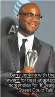  ??  ?? Barry Jenkins with the award for best adapted screenplay for ‘If Beale Street Could Talk’.