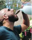  ?? HUSSEIN MALLA/THE ASSOCIATED PRESS ?? Lebanese arak turns milky white when mixed and is often served in a pitcher for easy pouring.