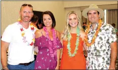  ?? NWA Democrat-Gazette/CARIN SCHOPPMEYE­R ?? Jeremy and Melissa Carter and Lauren and Casey Spear enjoy the Beach Bingo Bash.