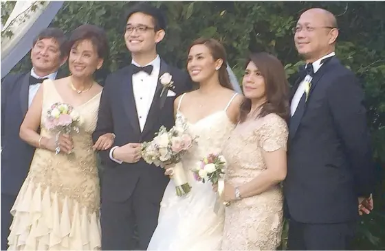  ??  ?? Nikki and BJ with their parents Butch Albert and Lily Chan (left) and Dino and Julie Gil