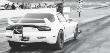  ?? ?? Peter Daby’s Mazda RX-7 clocked the fastest time of the day in the 9-second class