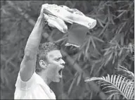  ??  ?? Venezuela’s opposition leader Leopoldo Lopez, who has been granted house arrest after more than three years in jail, salutes supporters in Caracas,Venezuela.