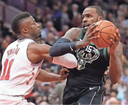  ?? GETTY IMAGES ?? The Bucks’ Shabazz Muhammad drives against the Bulls’ David Nwaba on Friday night.