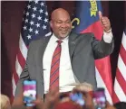  ?? CHUCK BURTON/AP ?? North Carolina Lt. Gov. Mark Robinson celebrates winning the Republican gubernator­ial primary in Greensboro on March 5.